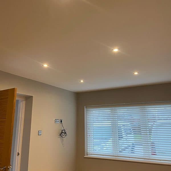 Freshly certified room with recessed downlights