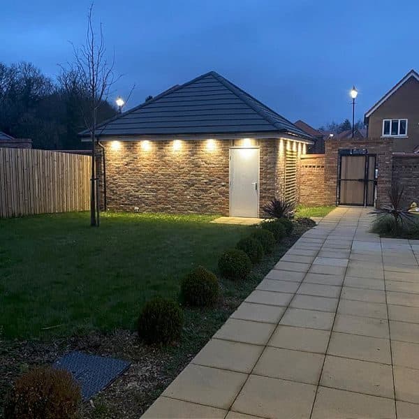 Exterior house lighting scheme at dusk